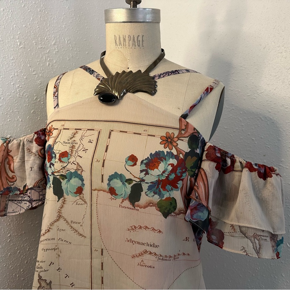 Brand: bebe world map blouse with off the shoulder ruffle  🍉 Palestine on map